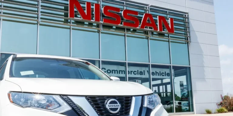 New vehicles at a Nissan Car and SUV Dealership.