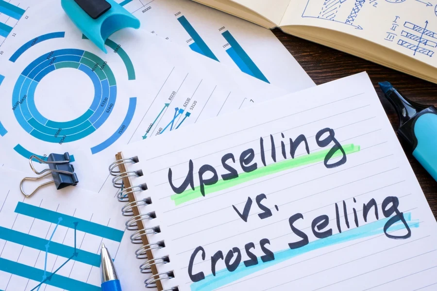 Notepad written upselling vs cross selling