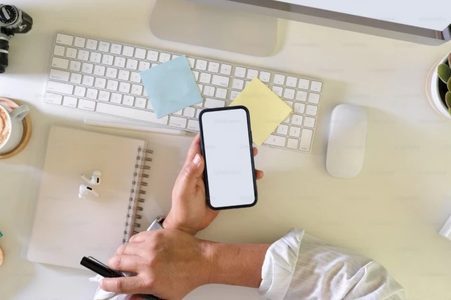 Overhead shot of a person using a smartphone