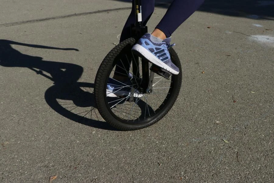 Person riding a unicycle