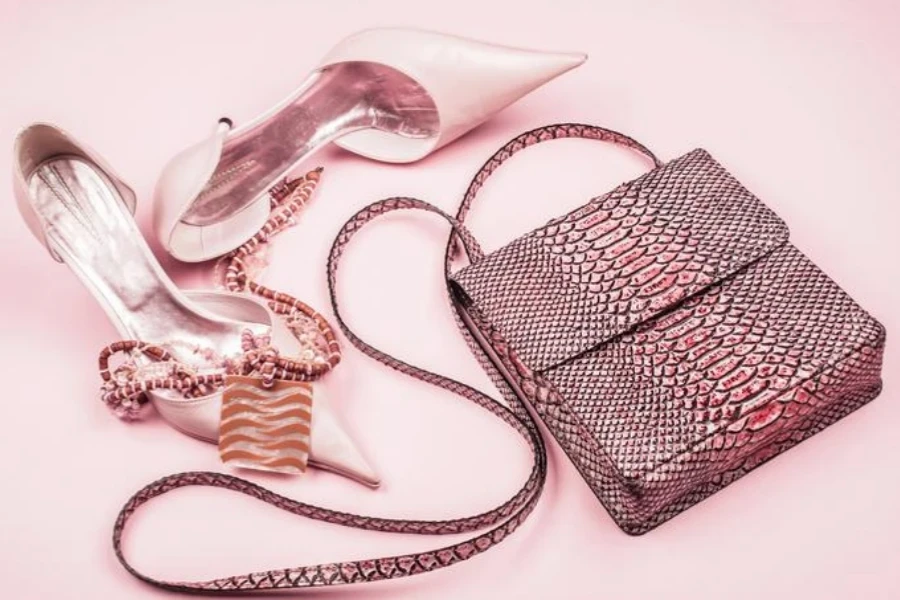 Pink women's fashionable accessories isolated