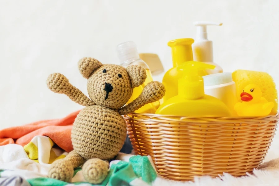 Selective focus on shampoo bottles and bath toys