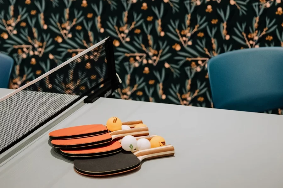 Table tennis products on table with different balls