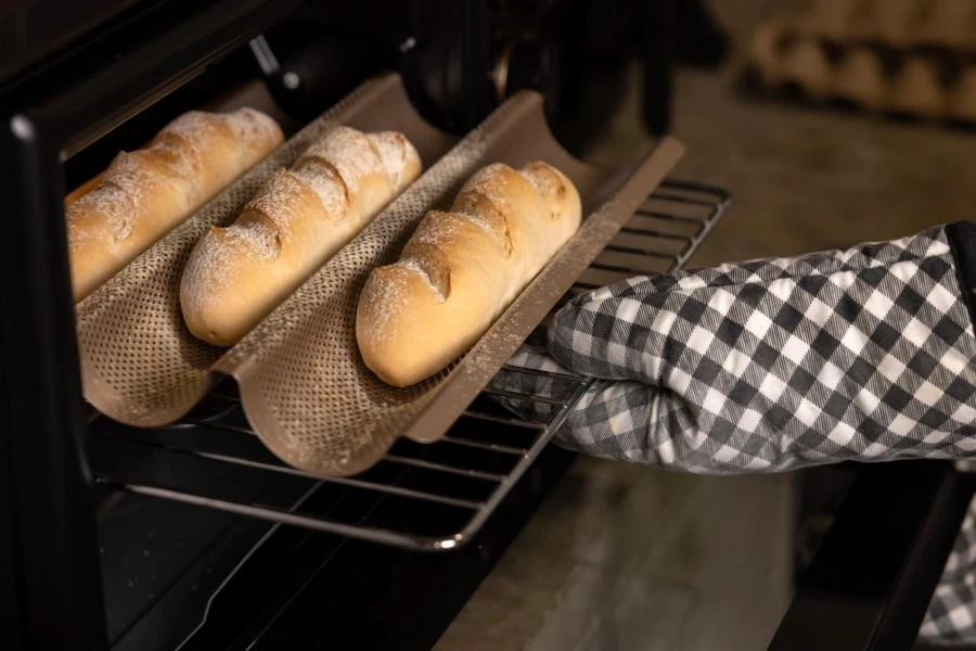 Woman Pull Bread out of the Oven