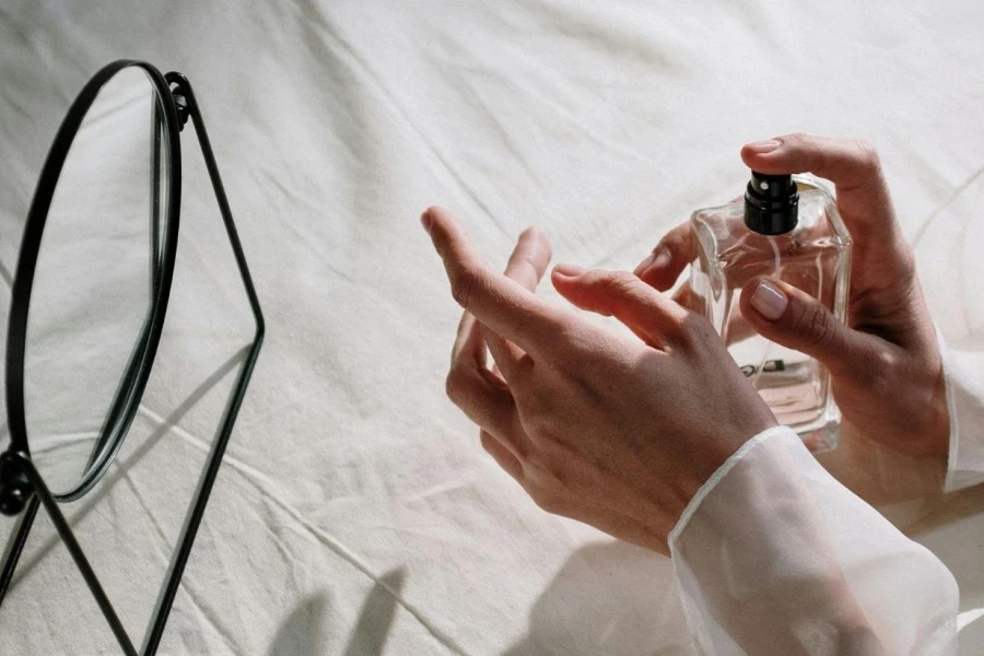 Woman Spraying Perfume