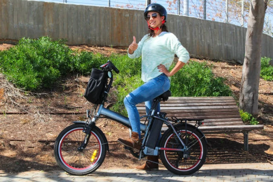 Woman with Electric Bicycle