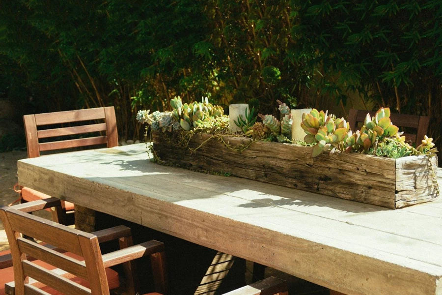 Wood and stones are key elements for rustic patio design