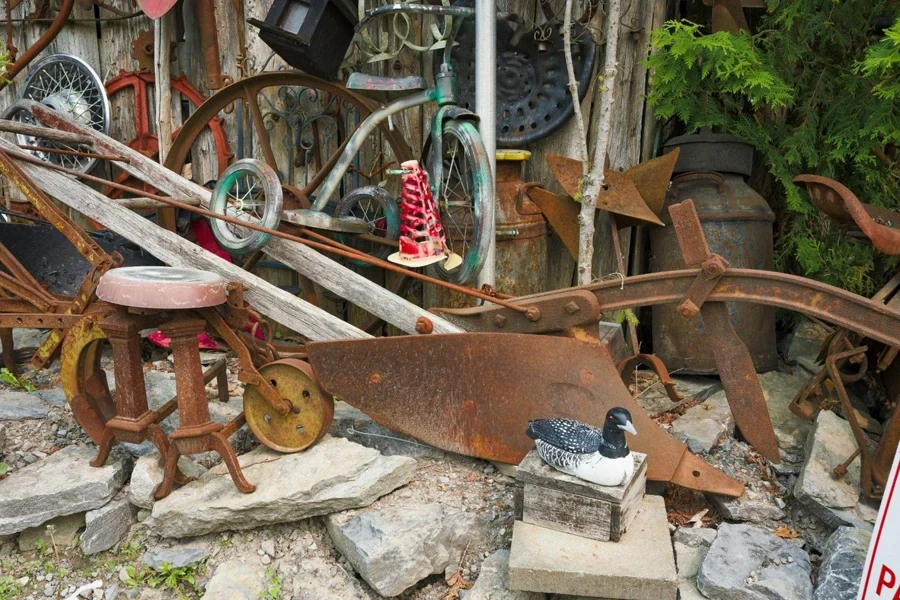 a pile of junk sitting on top of a pile of rocks