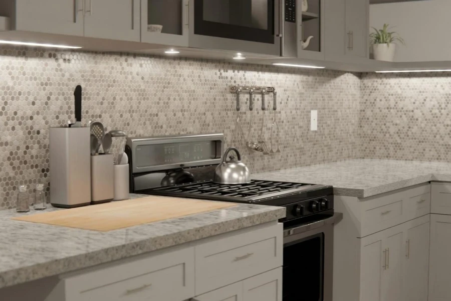 backsplash with small tiles in the tones of beige and white