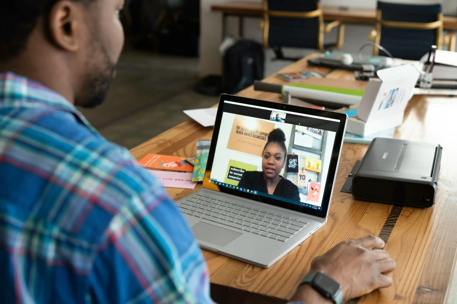 man on business video call on his laptop