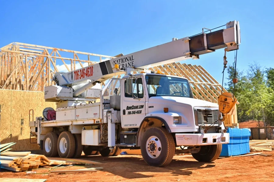 Medium sized boom truck on site