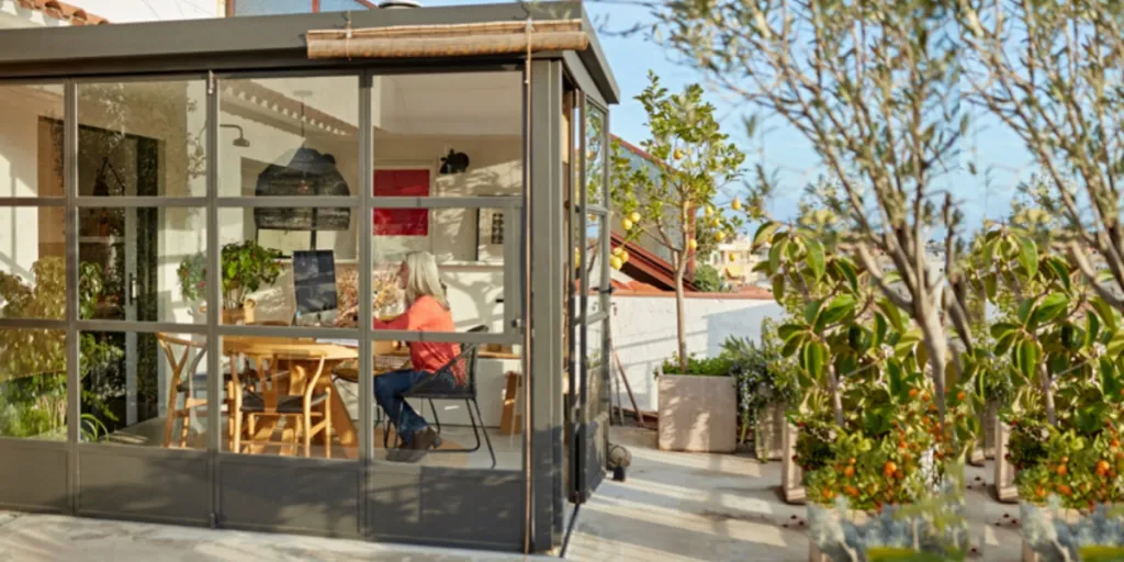 woman working in a solarium in a sunny day