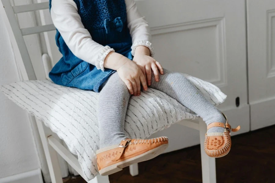 A Girl Sitting on the Chair