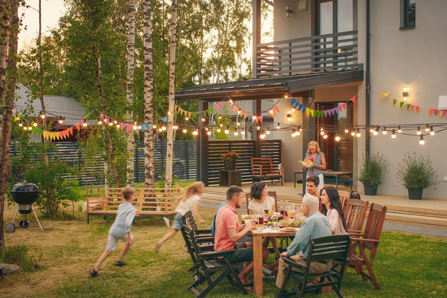 A big family celebration at a decorated outdoor garden