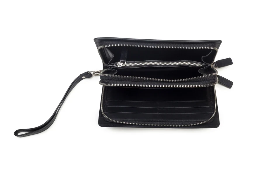 A black wristlet wallet on a white background