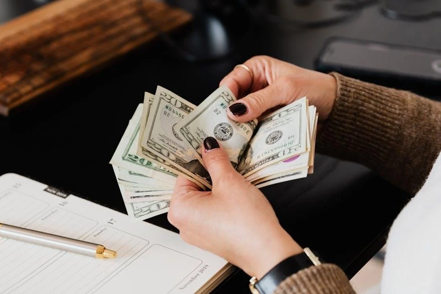 A business person counting cash