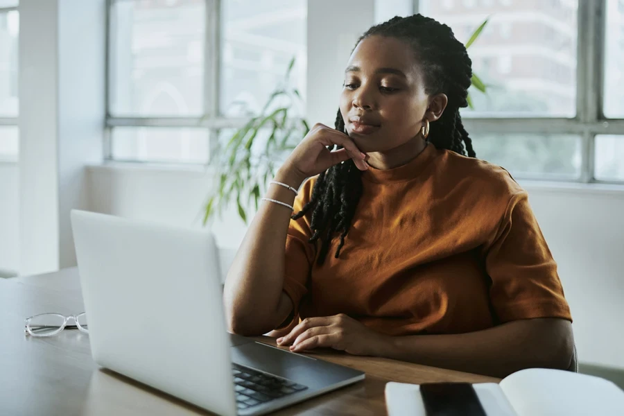 A businesswoman working on her laptop