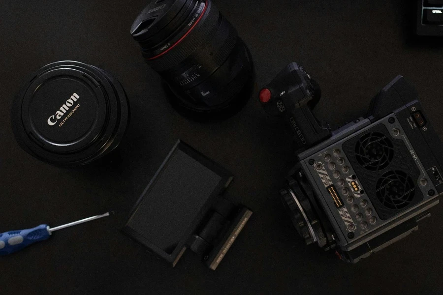 A camera and other equipment on a table