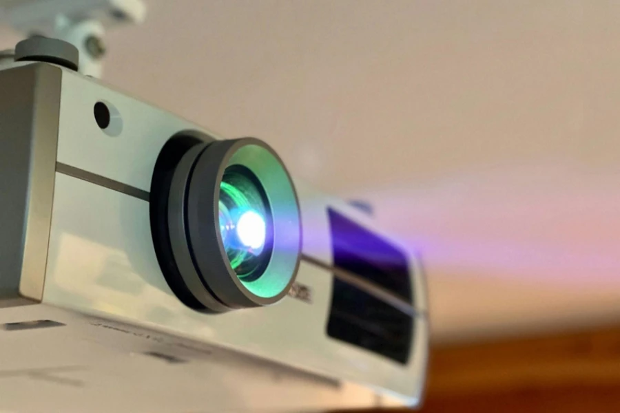 A close up of a projector on a ceiling