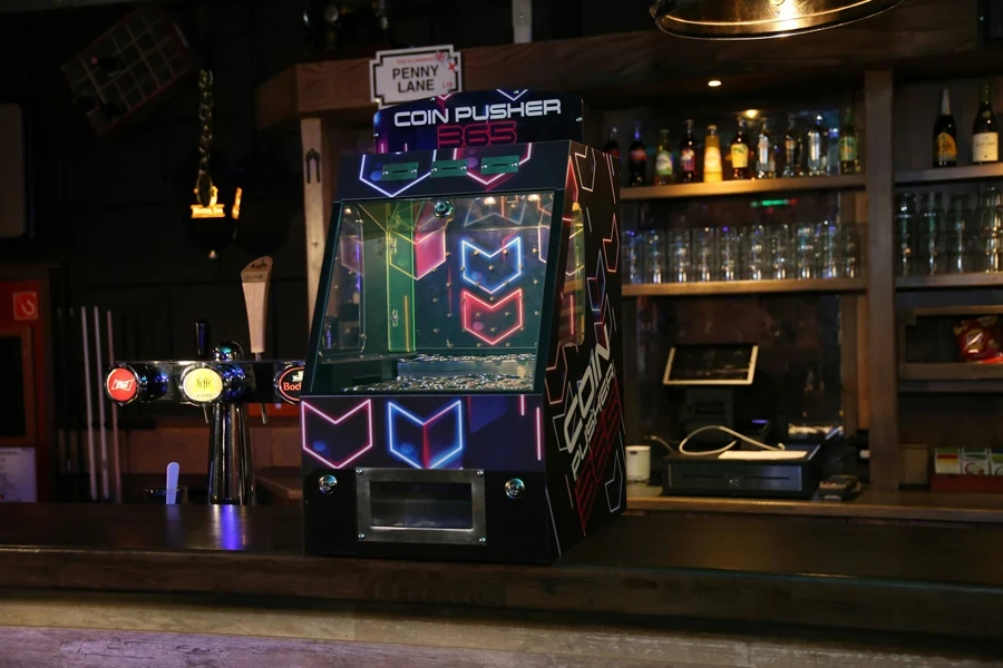 A coin pusher machine at a bar