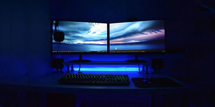 A computer desk with two monitors