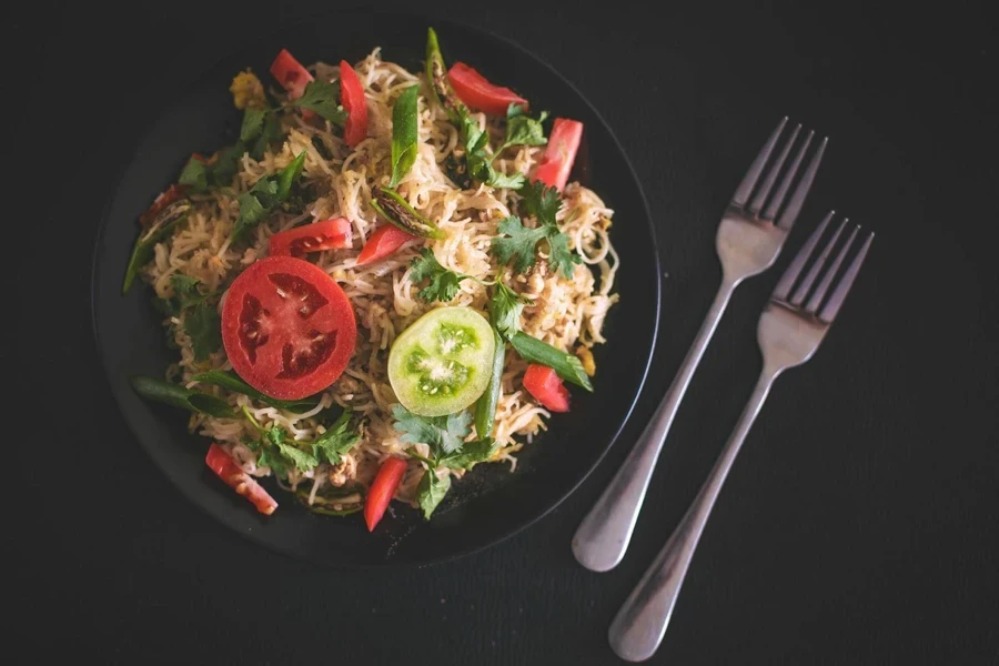 A delicious food next to two dinner forks