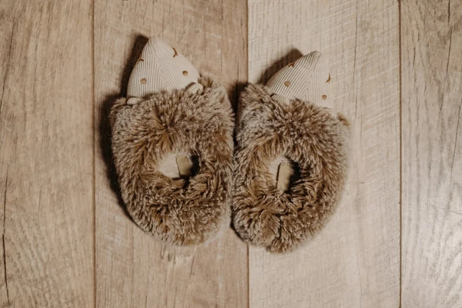 A pair of furry closed-back slippers