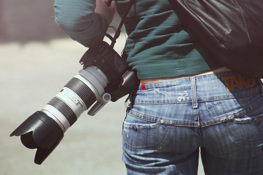 A person holding a camera