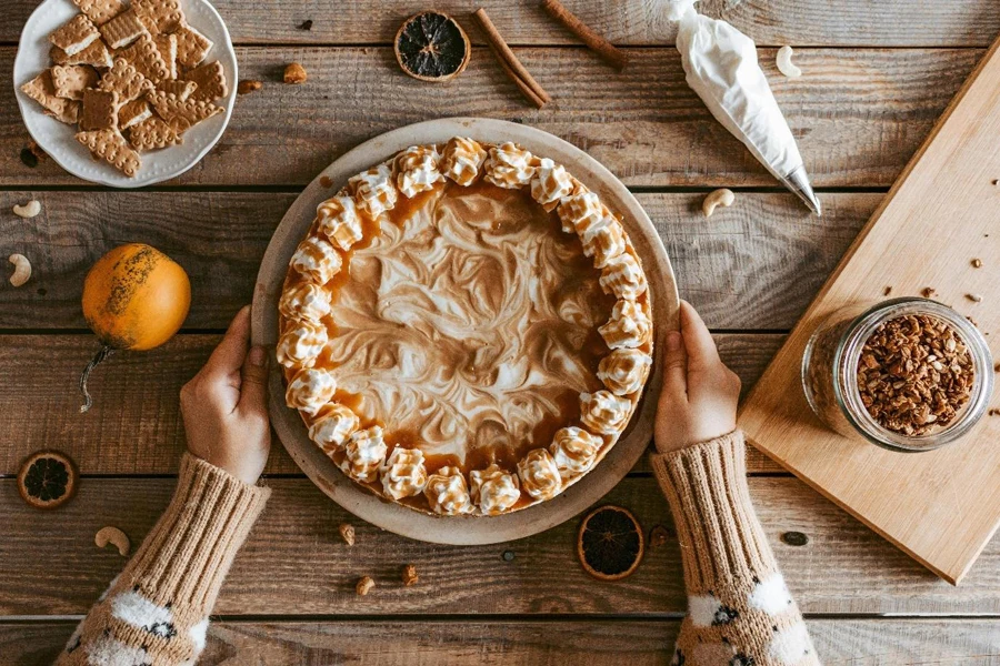 A person holding a pie