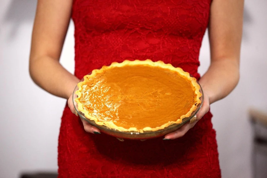 A person holding a pie