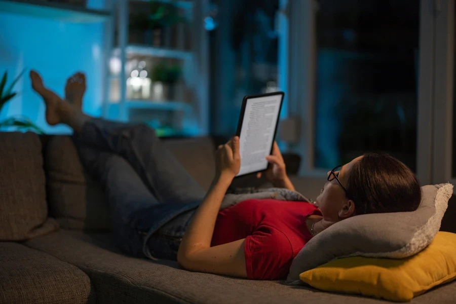 A person reading an ebook on a tablet