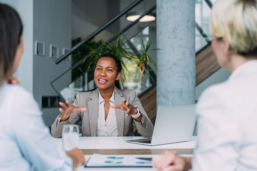 A sharp-looking sales engineer in a meeting