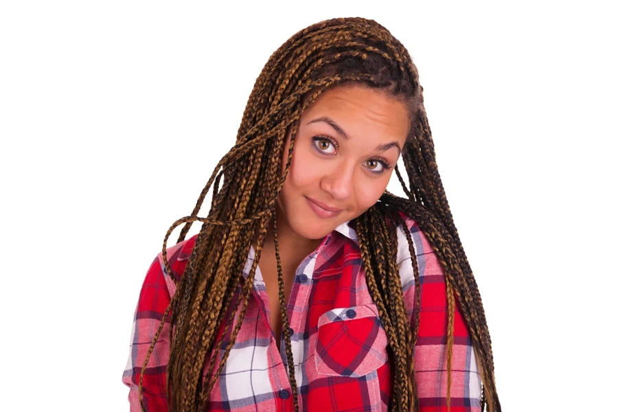 A woman with long locs