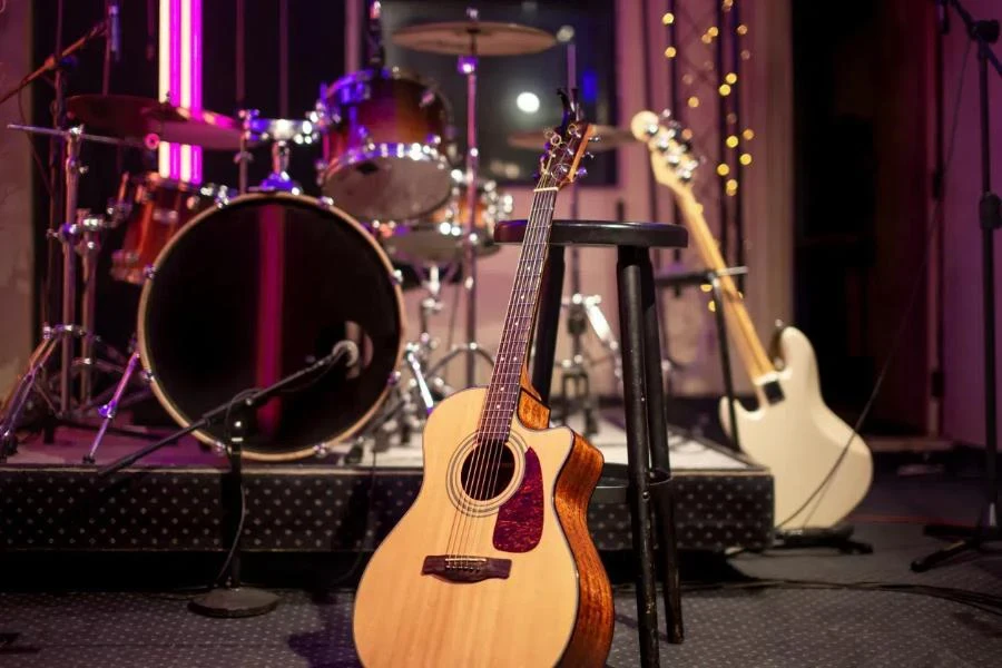 Acoustic guitar on the background of a recording Studio