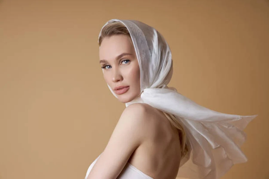 Beautiful Beauty Blonde Woman with a Large White Head Scarf