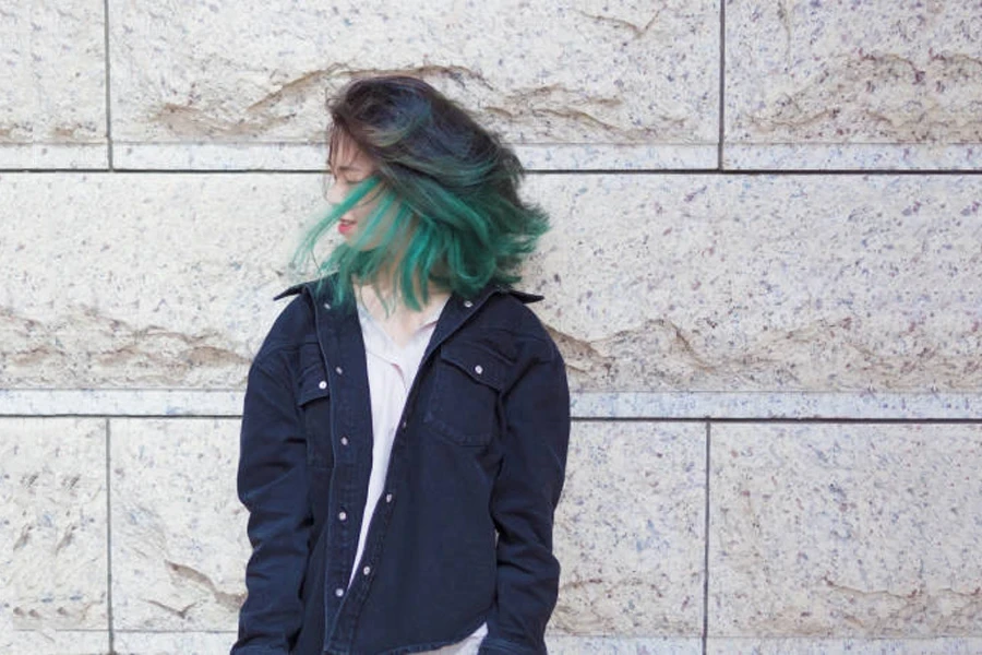 Beautiful Young Girl with Green Hair Posing Outdoor