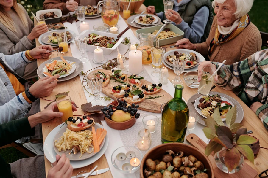 Big happy family enjoying Thanksgiving meal at the dining table