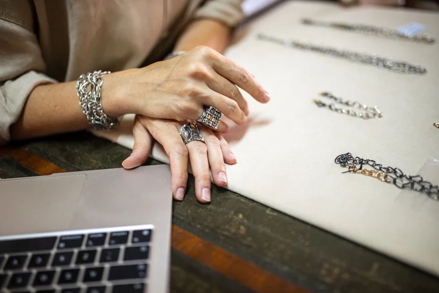 Businesswoman showcasing her jewelry to a store