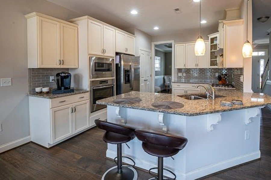 Farmhouse ceiling lights above a kitchen island