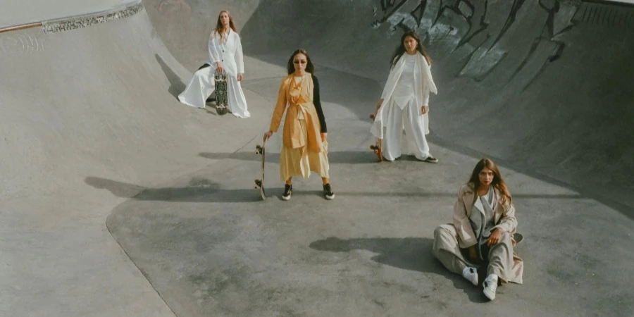 Four Women Standing in Skate Park