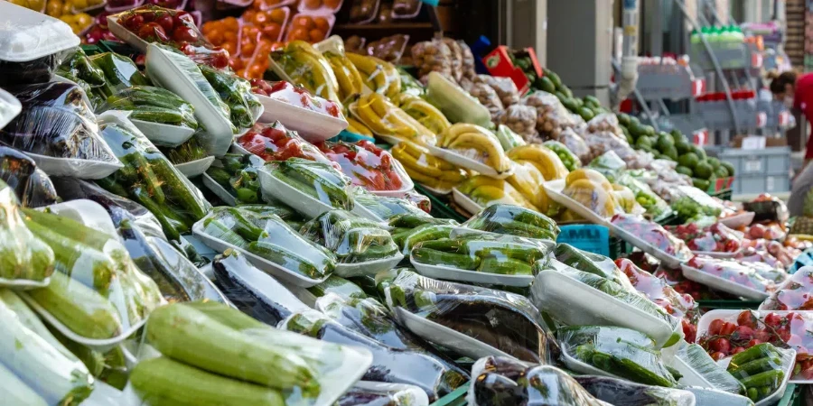 Fresh vegetables and fruits packed with stretch film