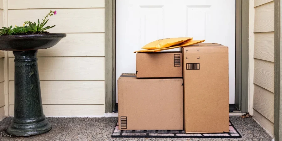 Front Door of House with Stack of Delivery Boxes from Online Ordering and E-commerce