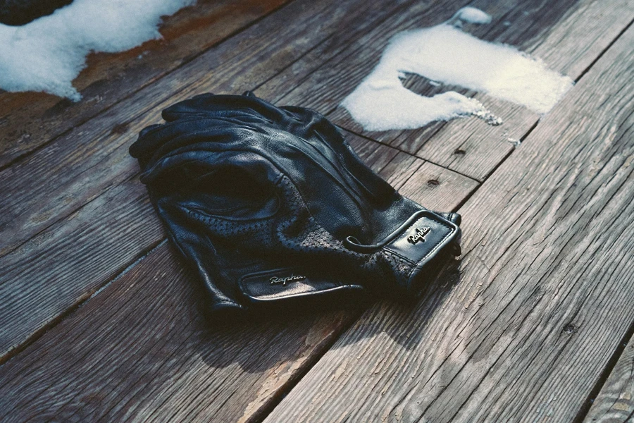 Gloves on wooden surface