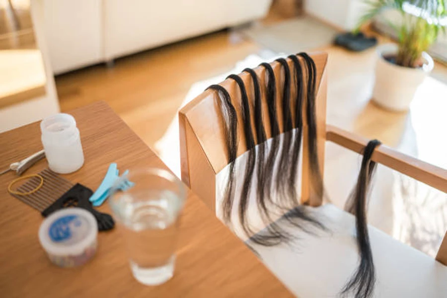 Homemade Hair Braiding Setup with Hair Extensions and Accessories