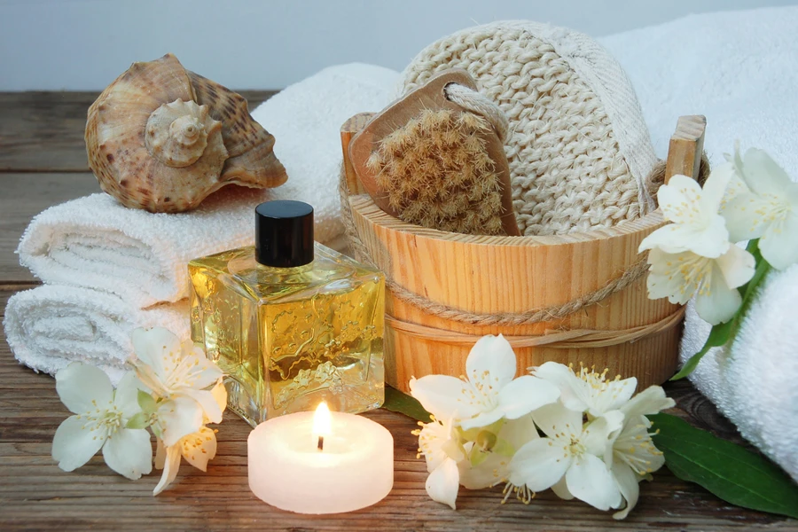 Jasmine flowers, perfume, and body care items