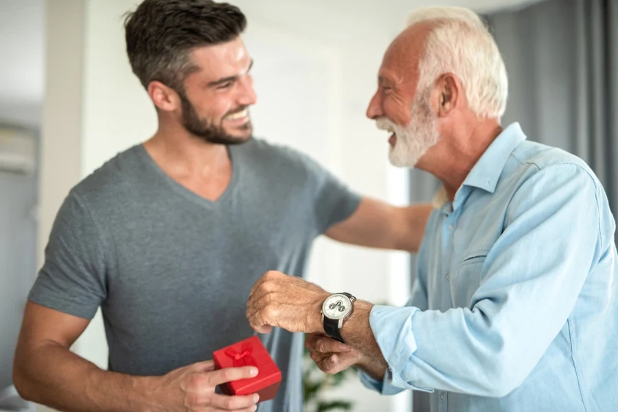 Man gifting his father a luxury watch