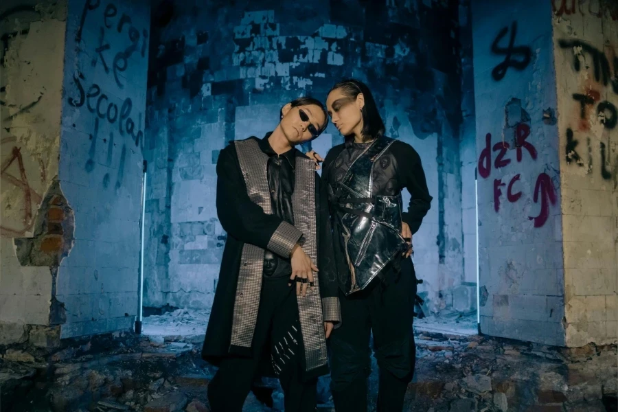 Man in Black Leather Jacket Standing Beside Woman in Black Leather Jacket