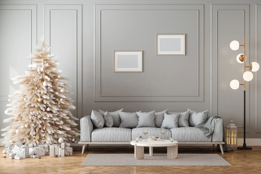 Modern living room with a white and gold Christmas tree