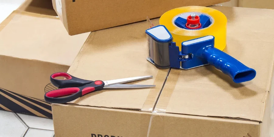 Packing tape dispenser