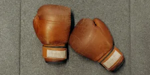 Pair Of Boxing Gloves on Gray Surface